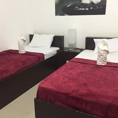 4C'S Tourist Lodge Puerto Princesa ภายนอก รูปภาพ