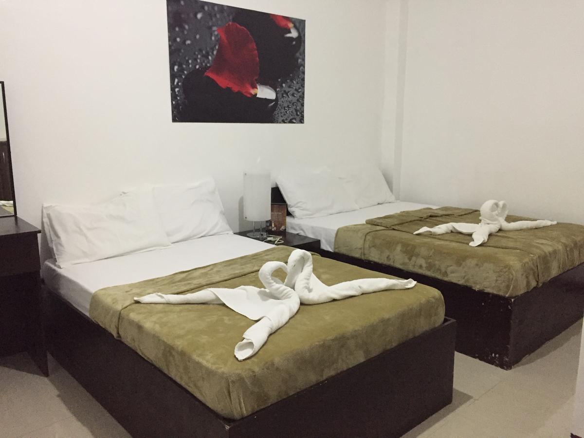 4C'S Tourist Lodge Puerto Princesa ภายนอก รูปภาพ
