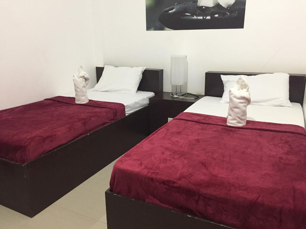 4C'S Tourist Lodge Puerto Princesa ภายนอก รูปภาพ