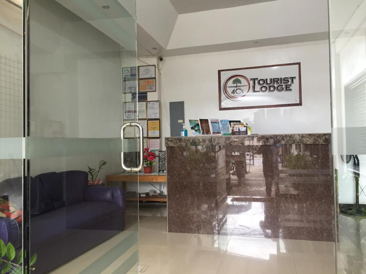 4C'S Tourist Lodge Puerto Princesa ภายนอก รูปภาพ